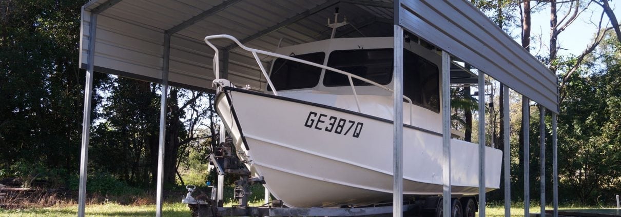 A boat under a boat shade shelter.