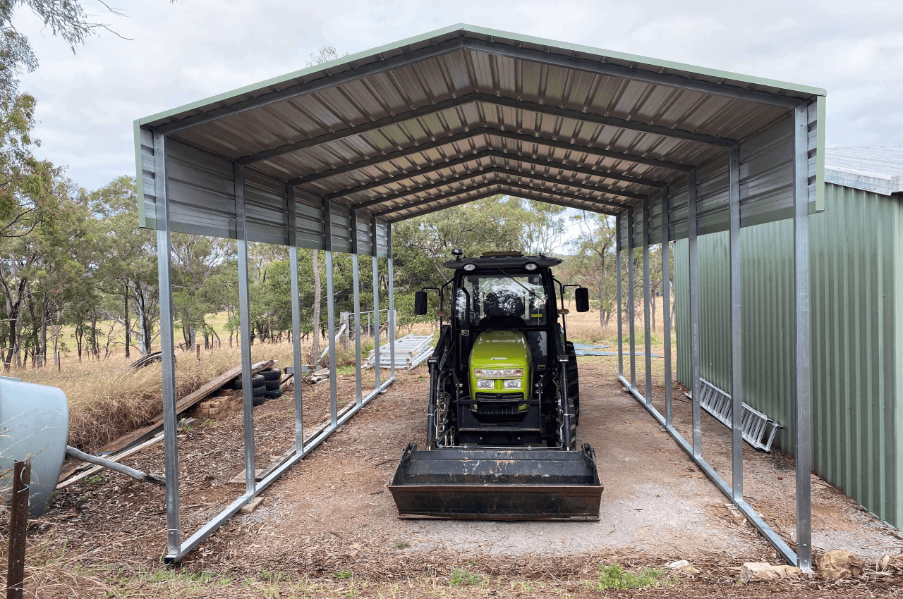 a tractor under a covered shed