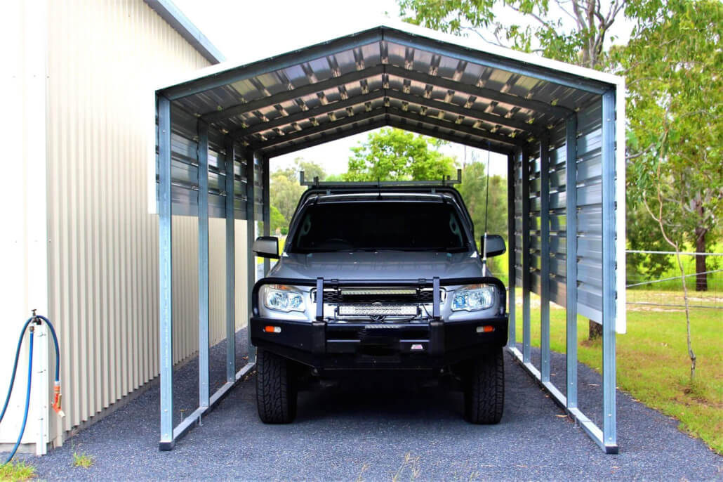 A ute parked in a carport.