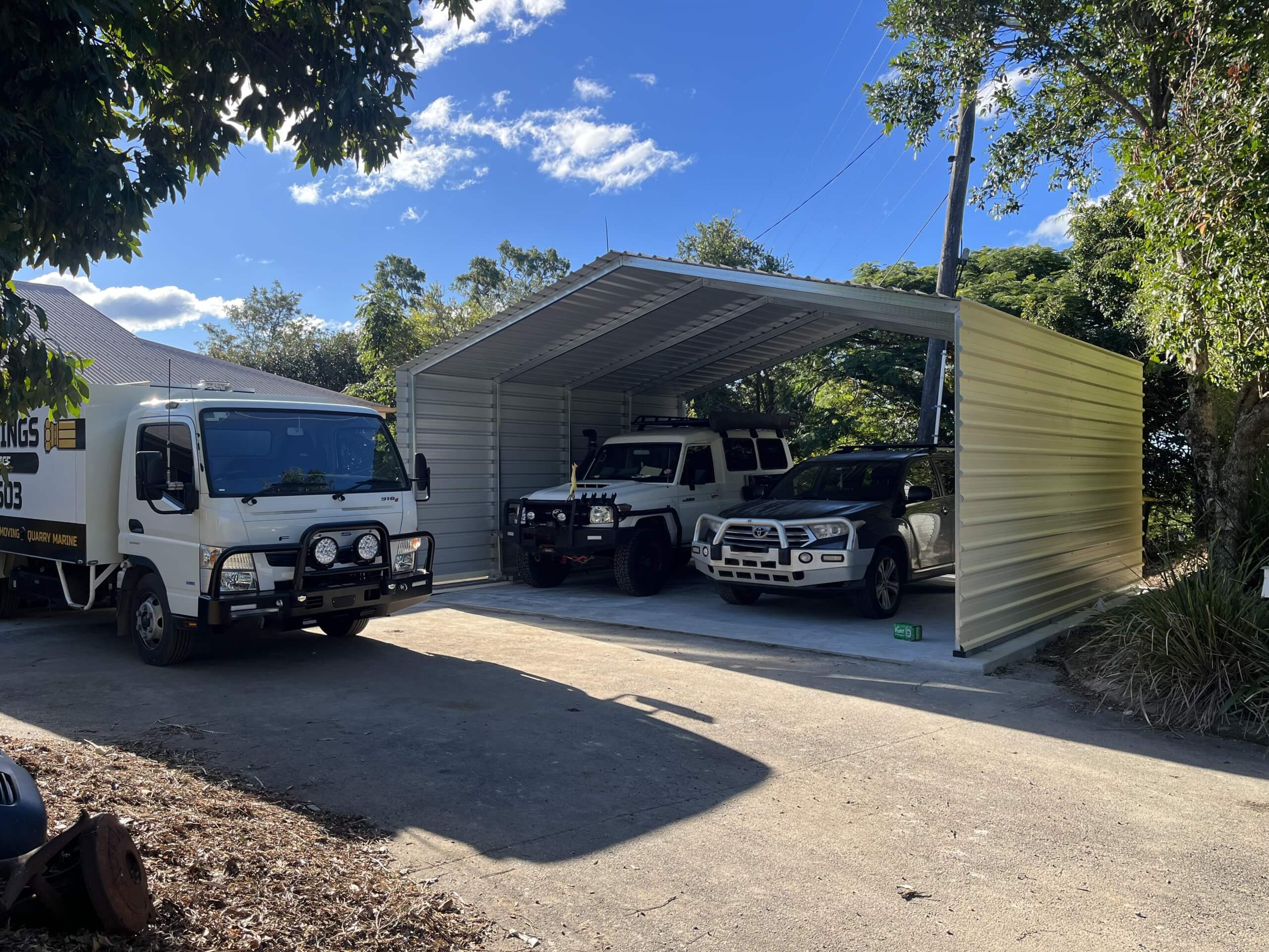 a group of cars parked in a garage