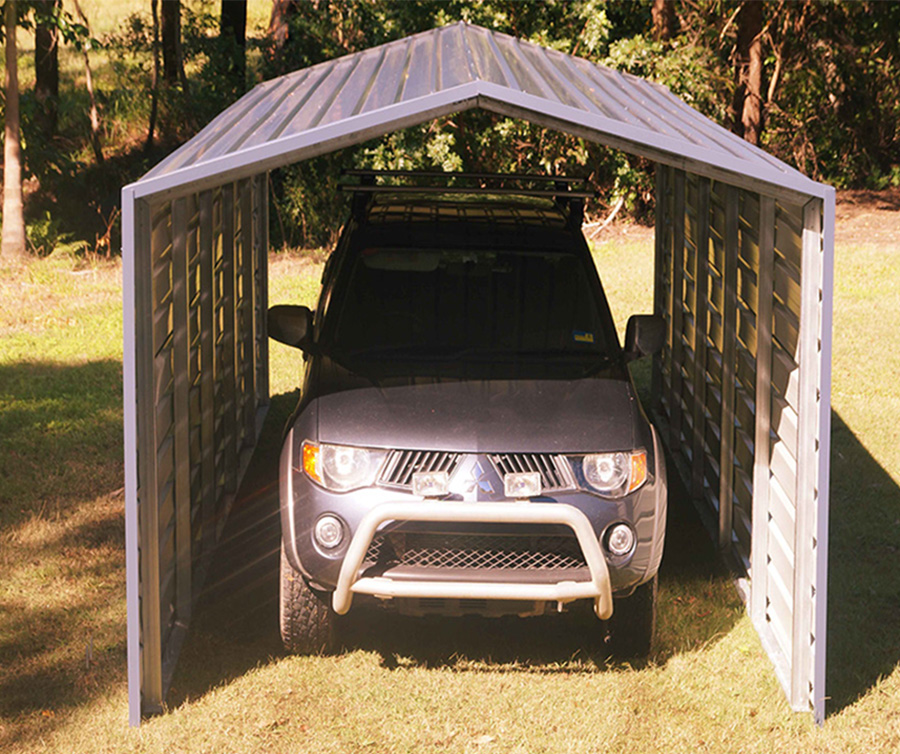 Car parked under metal shelter